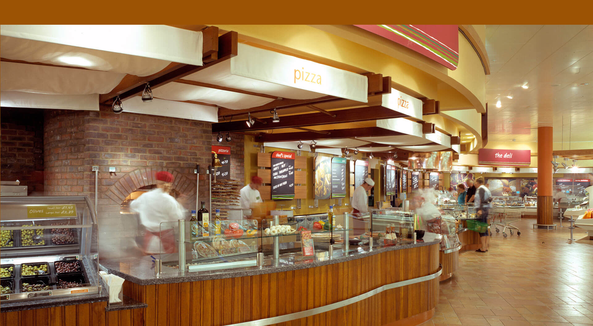 Safeway supermarket interior store design, merchandising and branding for hot food pizza and grill bar counters