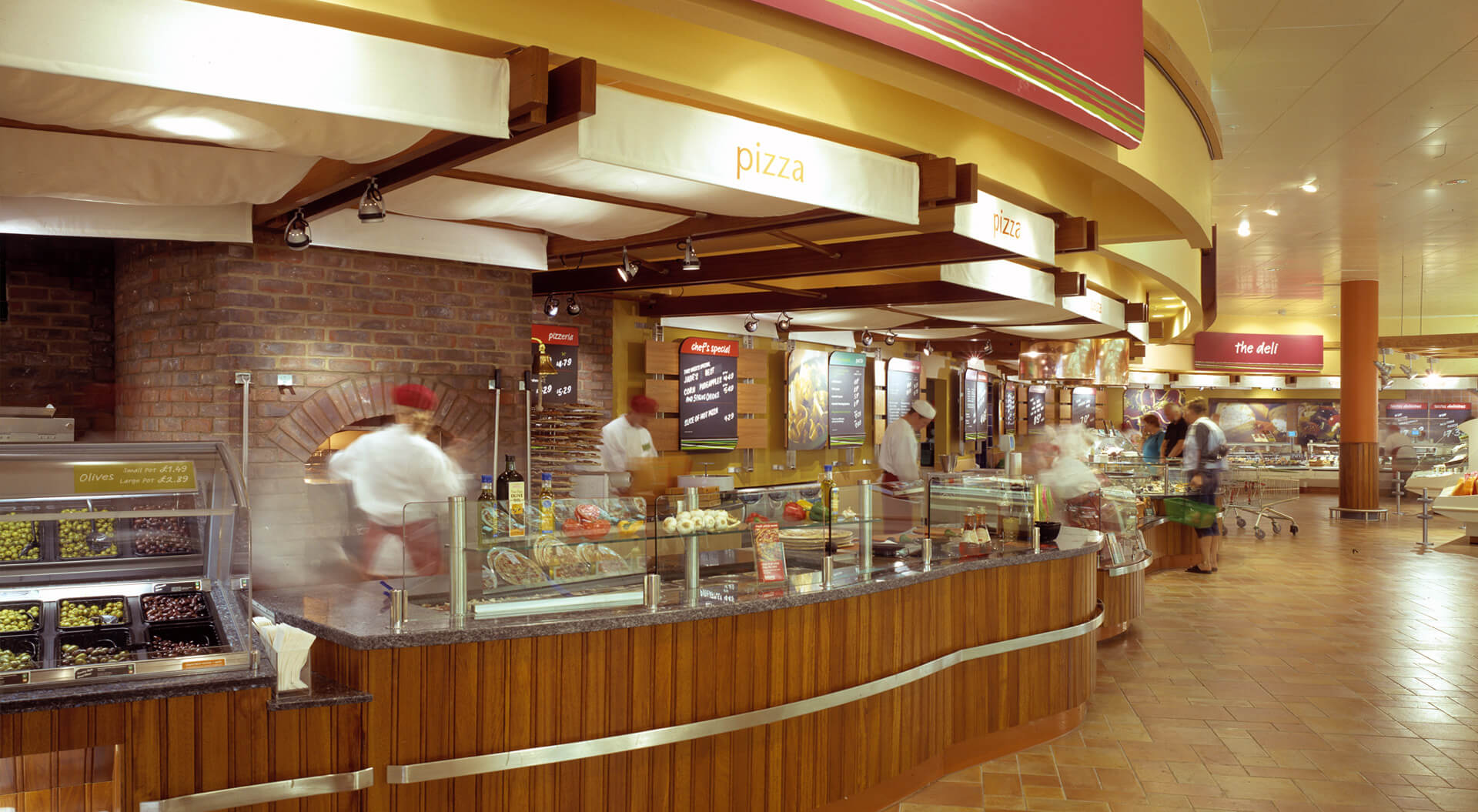 Safeway supermarket interior store design, merchandising and branding for hot food pizza and grill bar counters