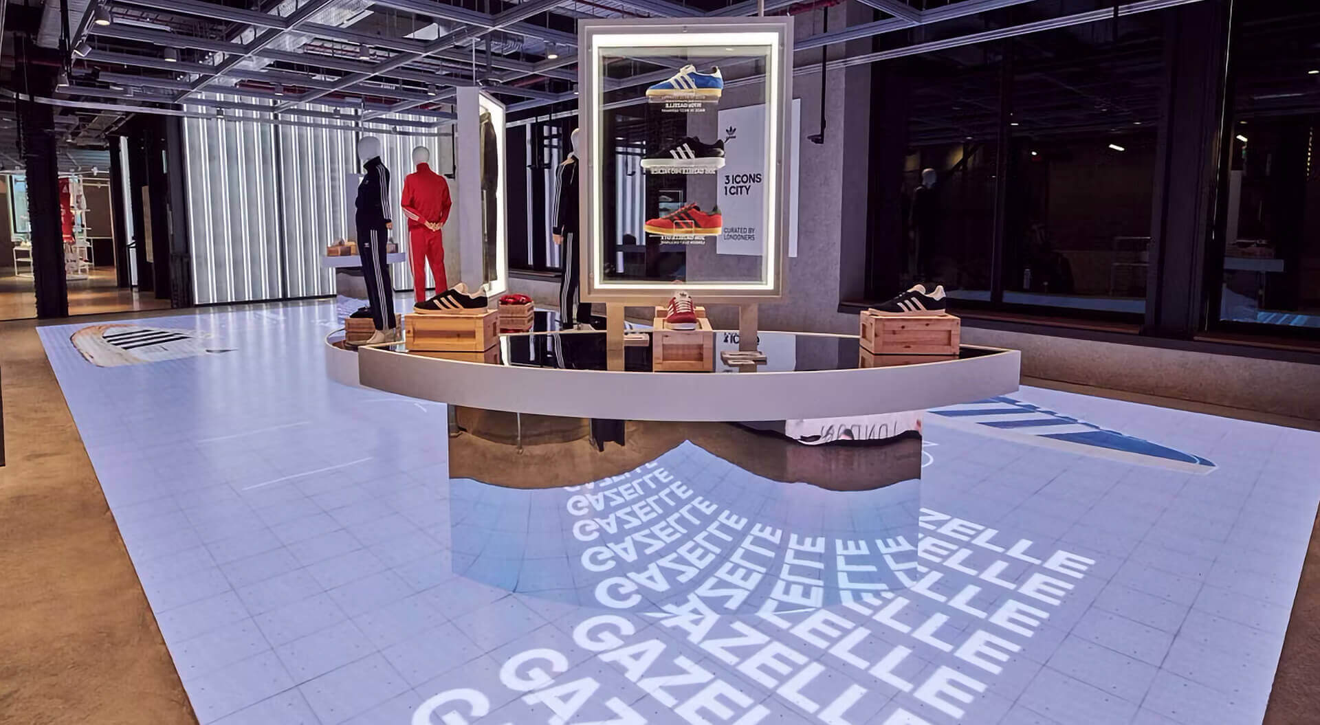 Nike house of innovation store Adidas merchandising system interior design.