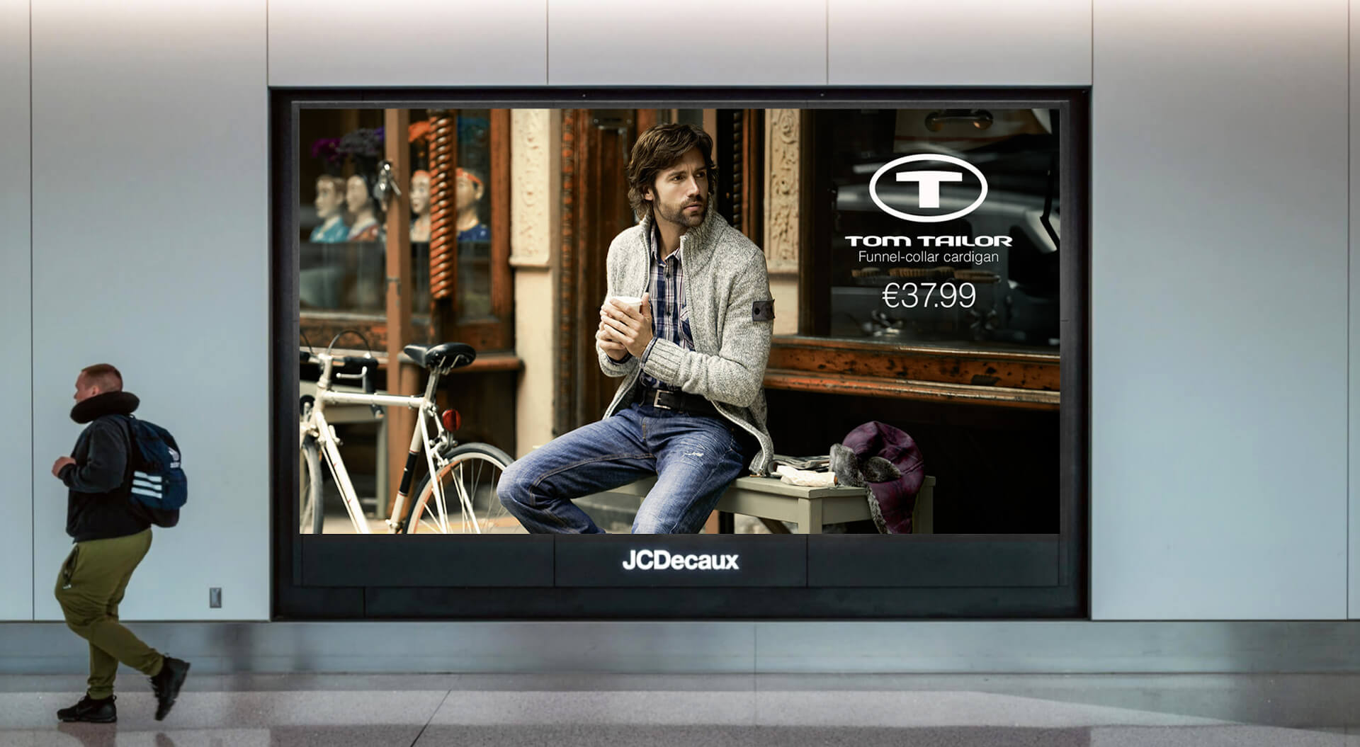 Tom Tailor brand external metro station media advertising promotion man