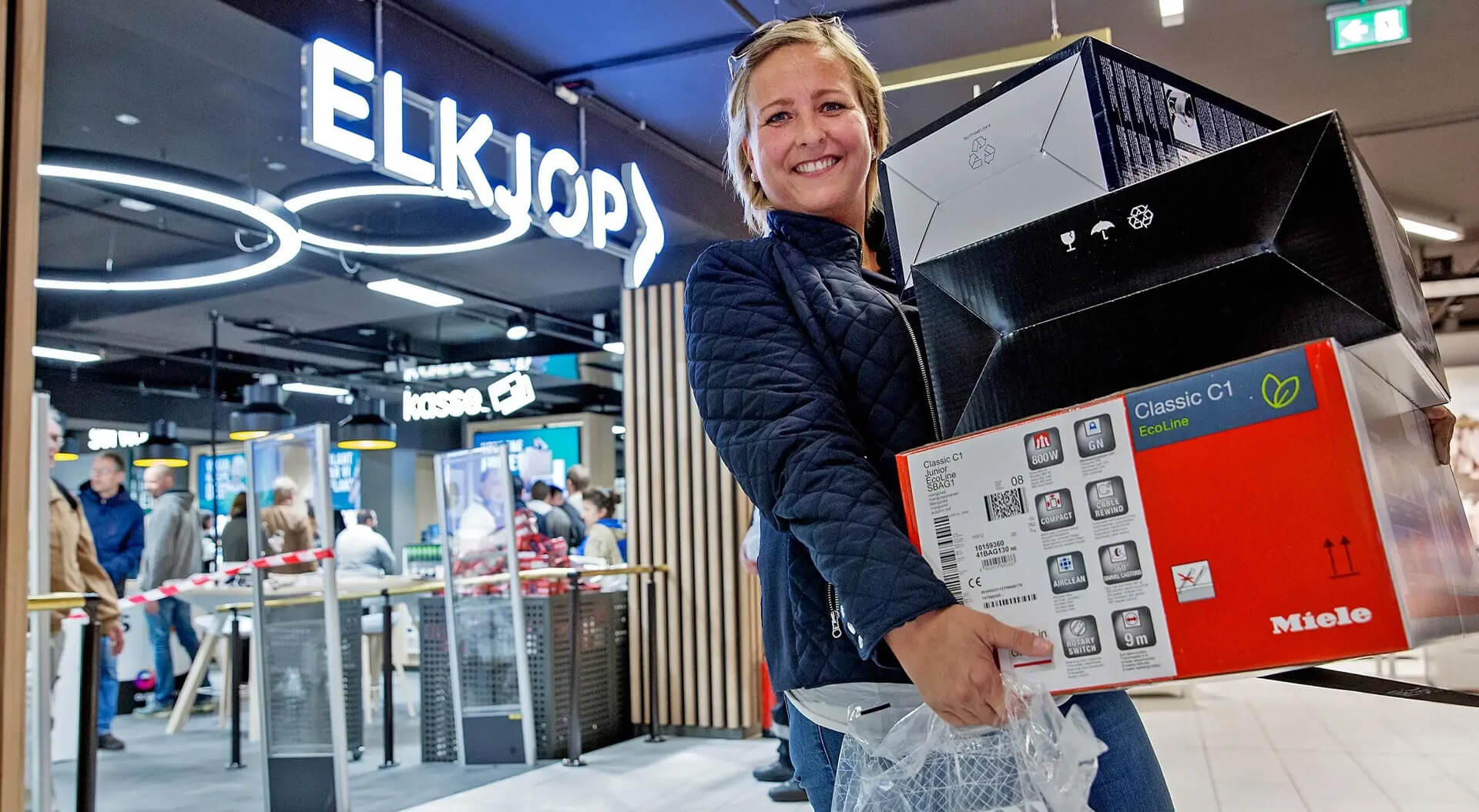 Elkjop Store Entrance and Branding - Customer and purchases