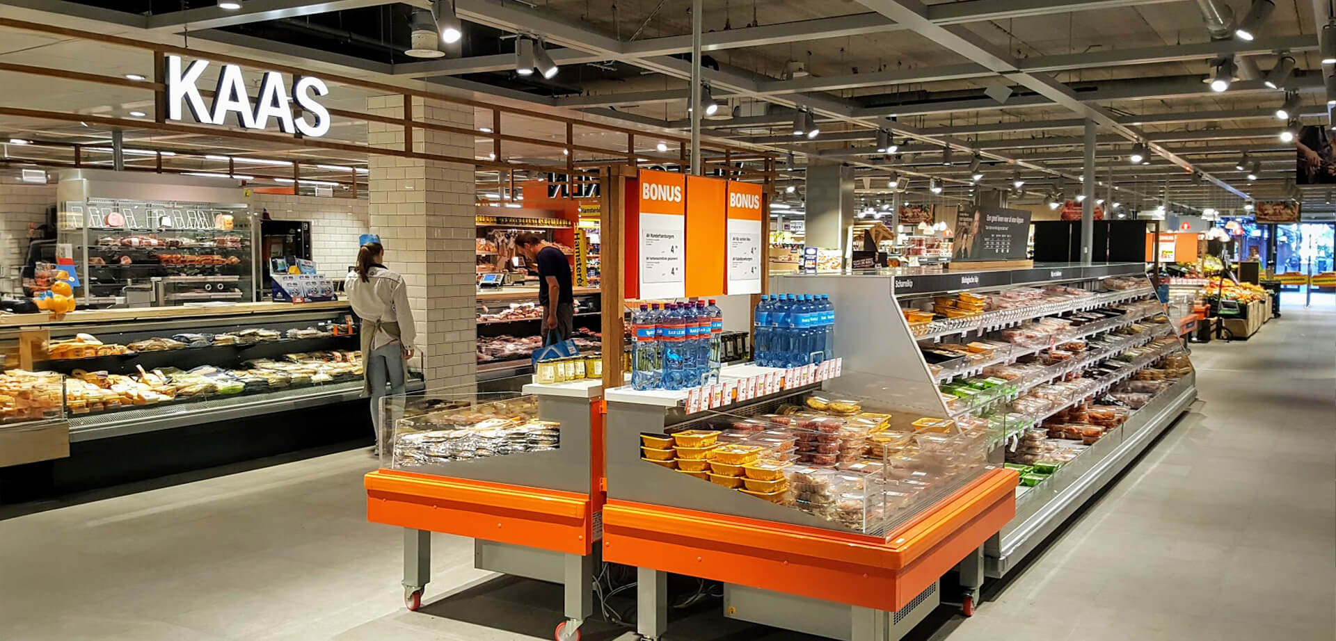 Albert Heijn is the largest supermarket chain in the Netherlands.  The store features a fresh market design with manned preparation stations and market-style produce displays. 