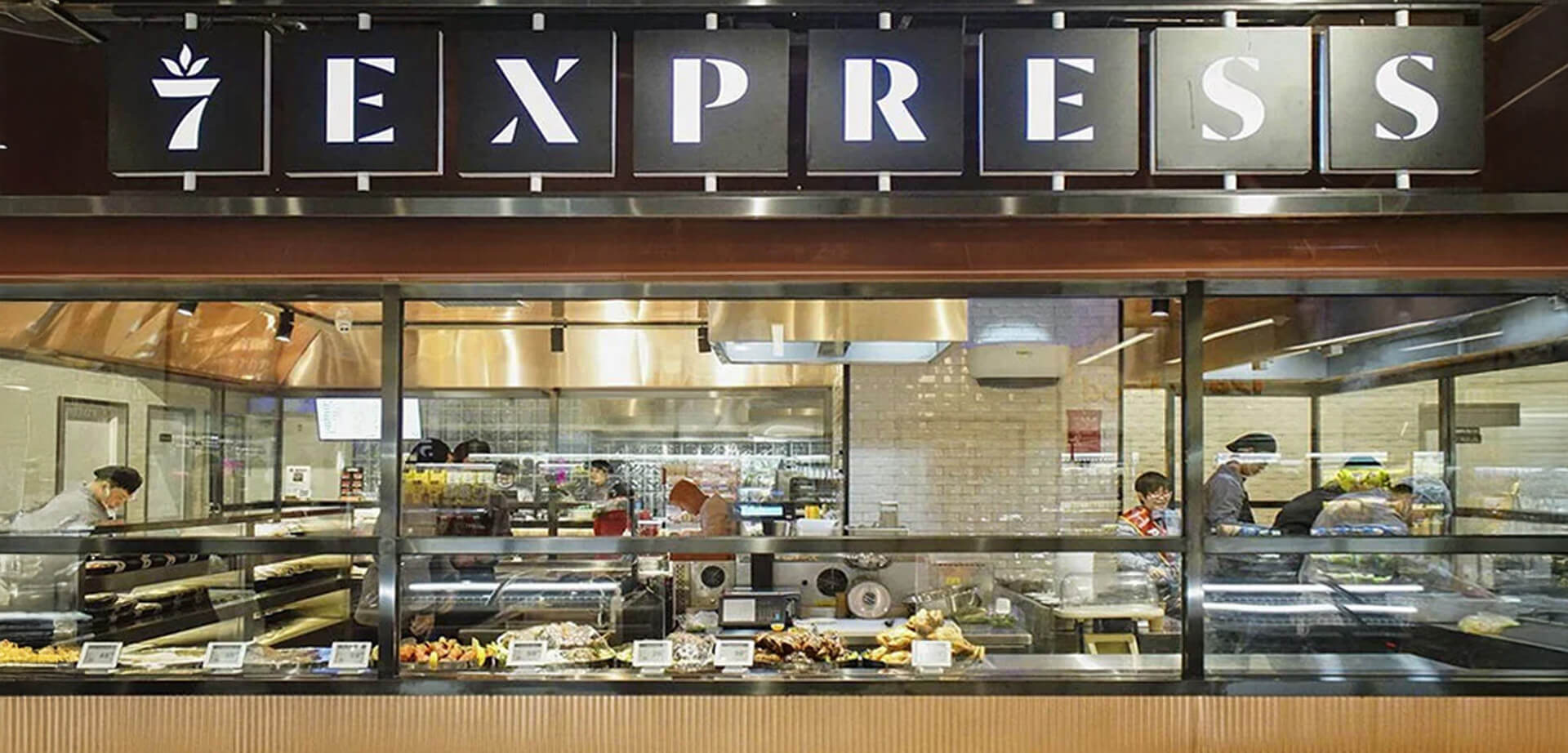 7 Express is part of 7 Fresh a futuristic grocery store that brings e-commerce convenience and supply chain efficiency to the physical world, creating a highly integrated and tech-forward shopping journey. 