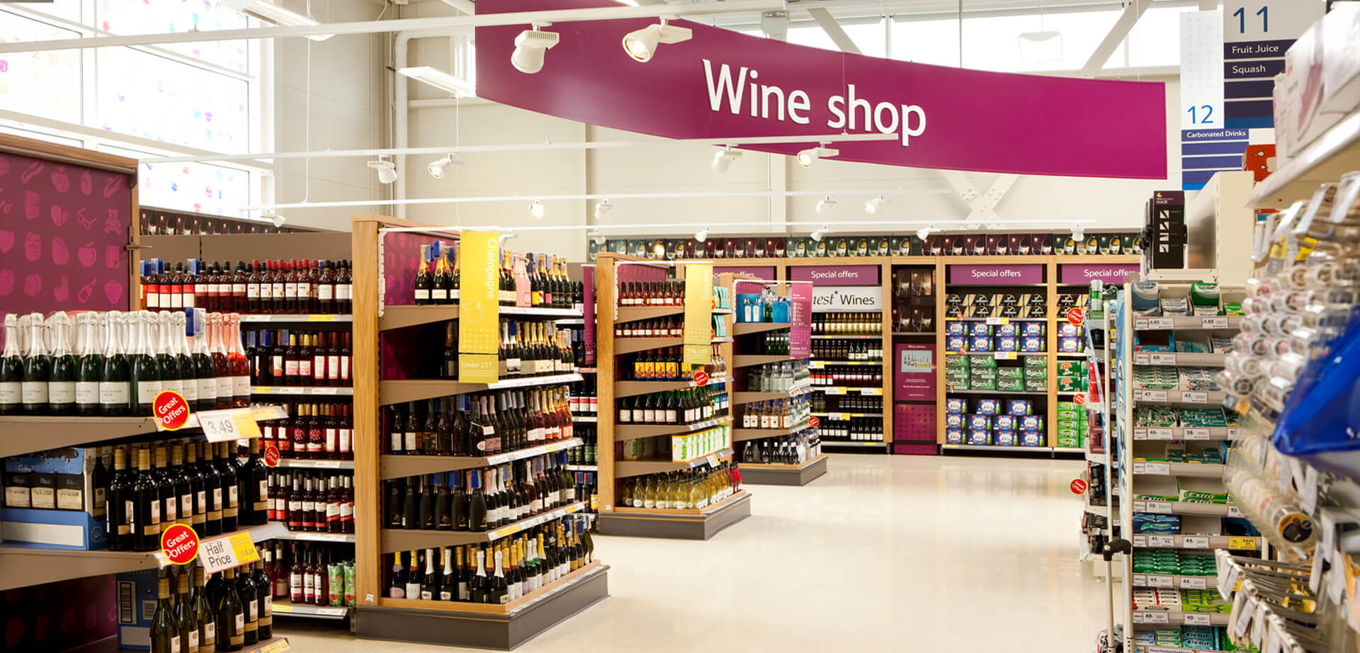 The Tesco Extra Hypermarket Accrington, Lancashire England.  Wine shop store design signage and merchandising.