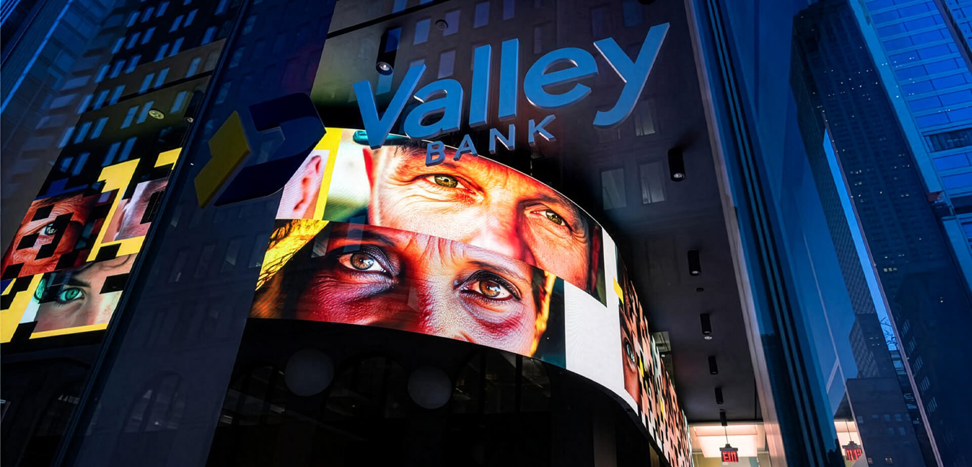 Valley Bank - The "Eyes of New York" Campaign Concept: The display shows dynamic, close-up images of diverse individuals' eyes from the local community. Purpose: The campaign is designed to reflect Valley Bank's commitment to understanding the unique stories and needs of its individual customers. 