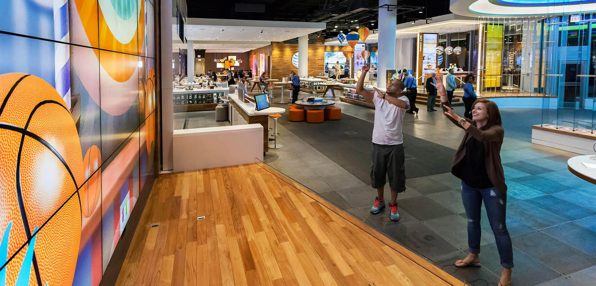 This image shows the interior of the first AT&T flagship store, which opened on Chicago's Magnificent Mile. 