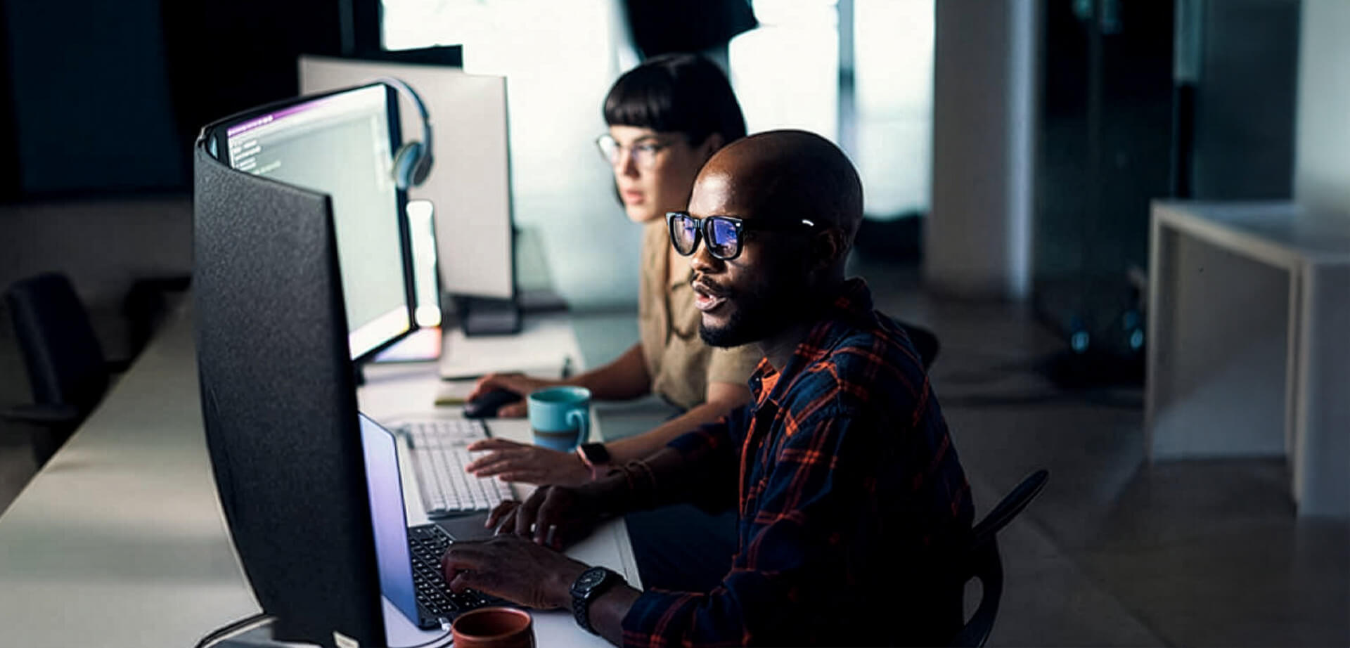 The work environment focuses on integrating enterprise systems and using AI-driven analytics to improve efficiency