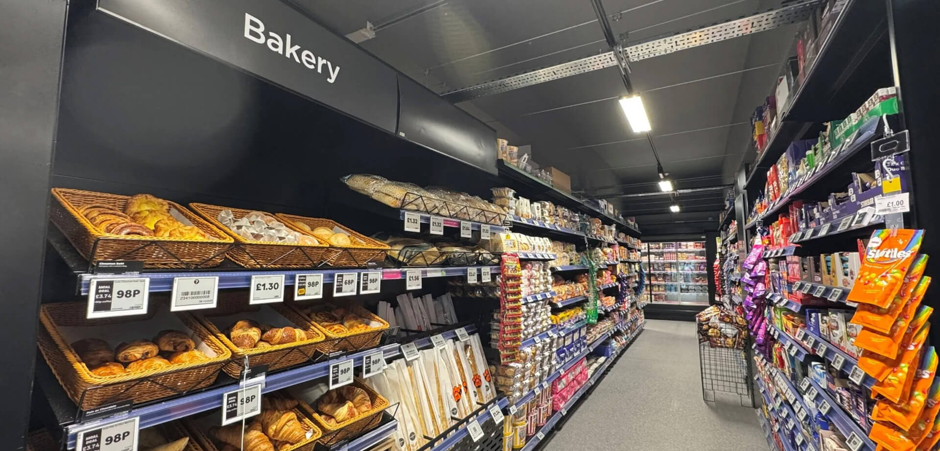Asda Express convenience bakery department, with a focus on high-footfall urban areas, residential neighbourhoods, and transport hubs.
