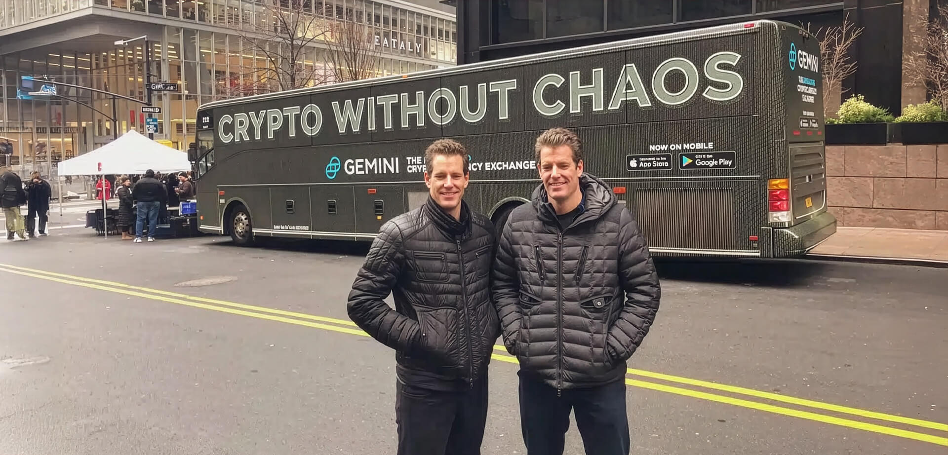 This image shows Cameron and Tyler Winklevoss, the billionaire tech entrepreneurs and founders of the global cryptocurrency exchange Gemini.