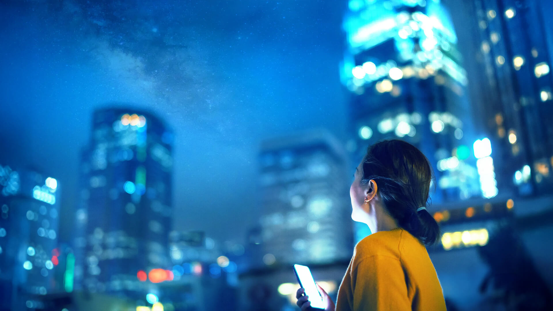 A woman searching a smartphone and thinking about the possibilitiesAGentic Ai