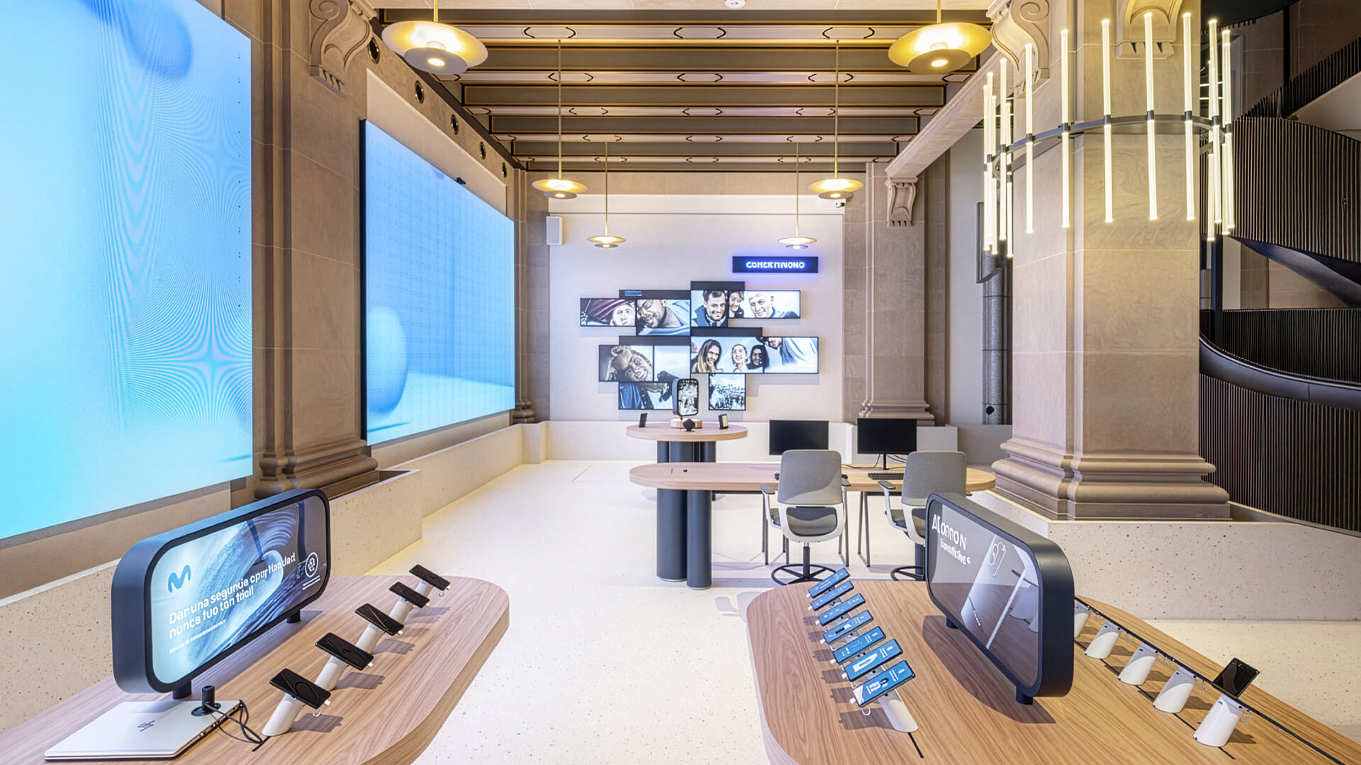 This image shows the flagship Espacio Movistar concept store located in the historic Telefónica building on Gran Vía, Madrid.