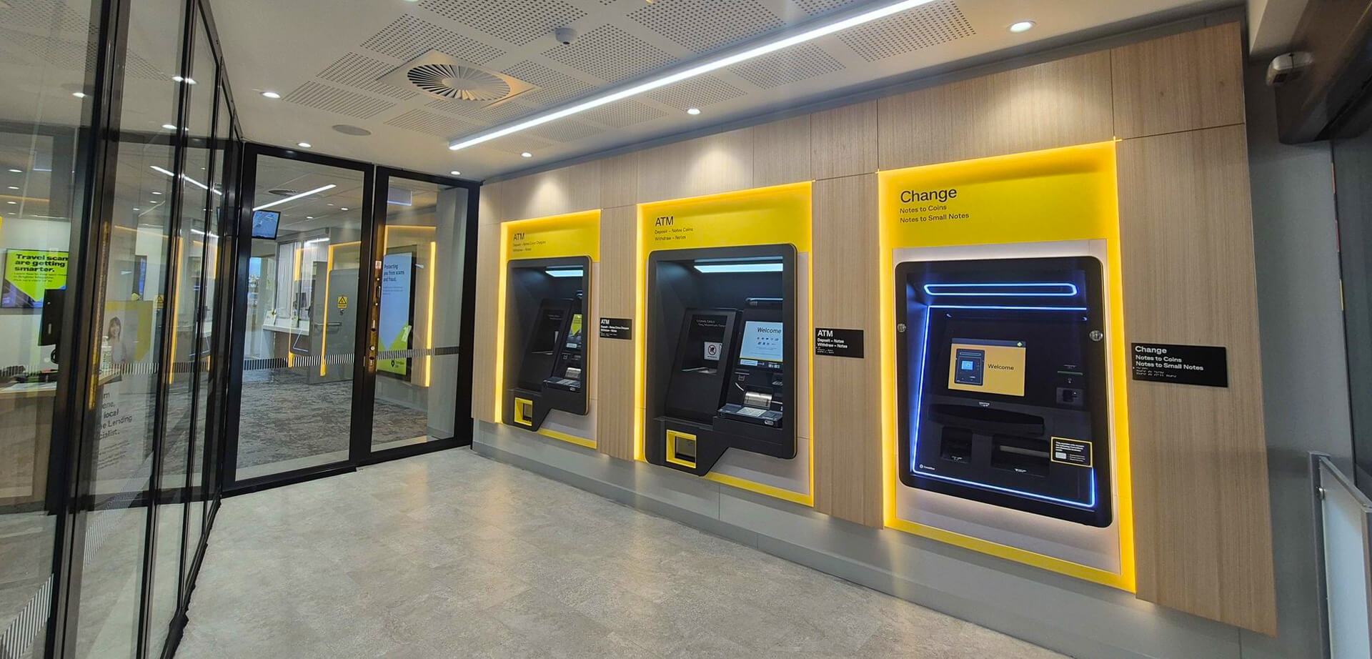 A Commonwealth Bank of Australia (CommBank) branch, which features modern ATMs and cash-exchange kiosks.