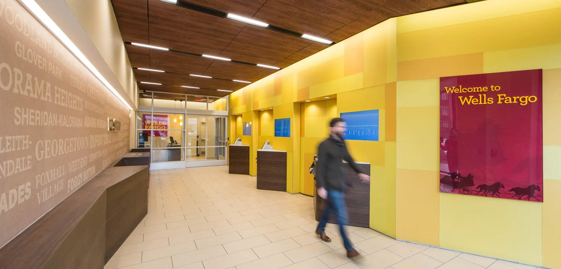 A Wells Fargo Branch Features: It replaces traditional bulky teller lines with private consultation desks, digital kiosks, and flexible meeting spaces for personalized customer service.