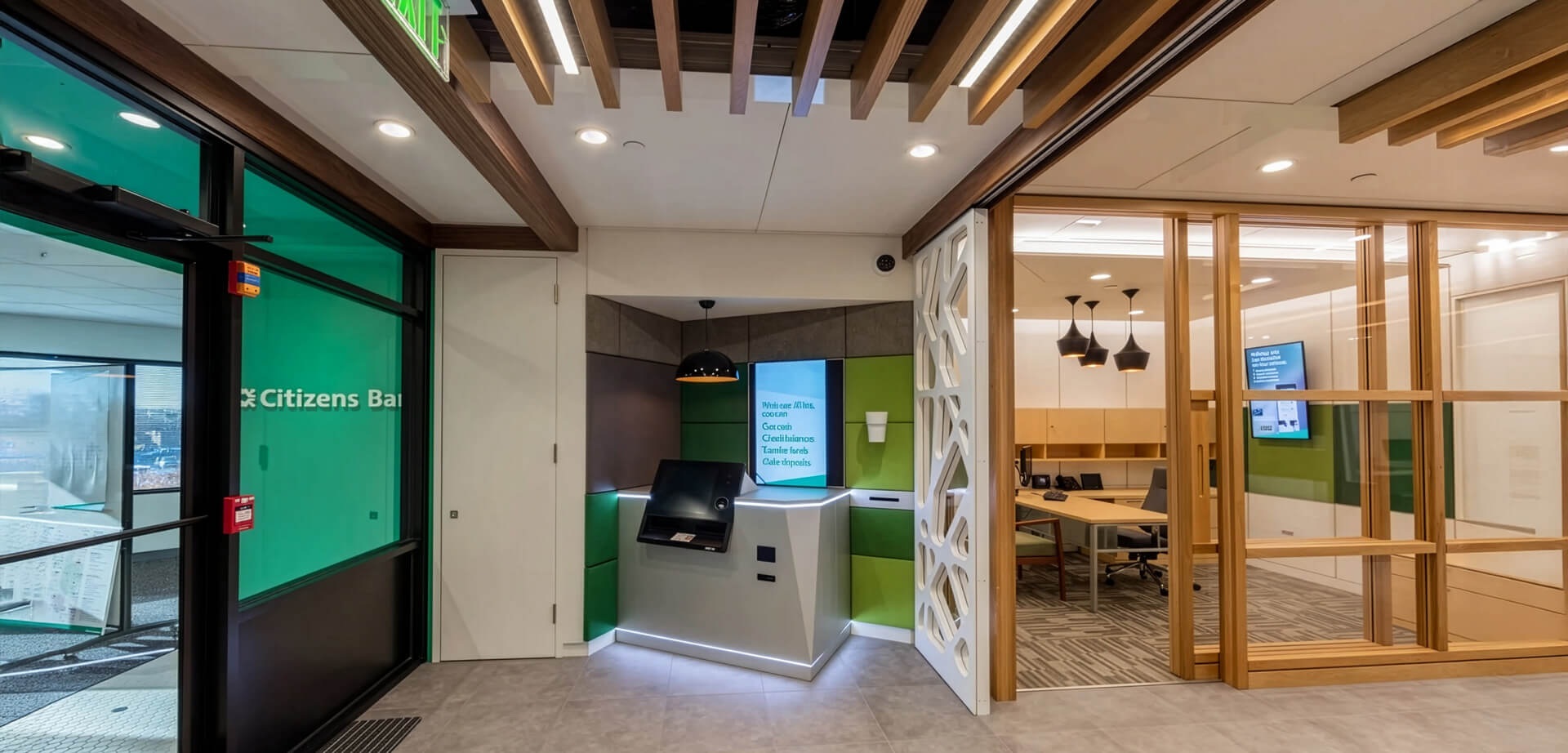 A Citizens Bank branch, with modern ATMs that help handle daily transactions efficiently without traditional teller lines and private meeting spaces.