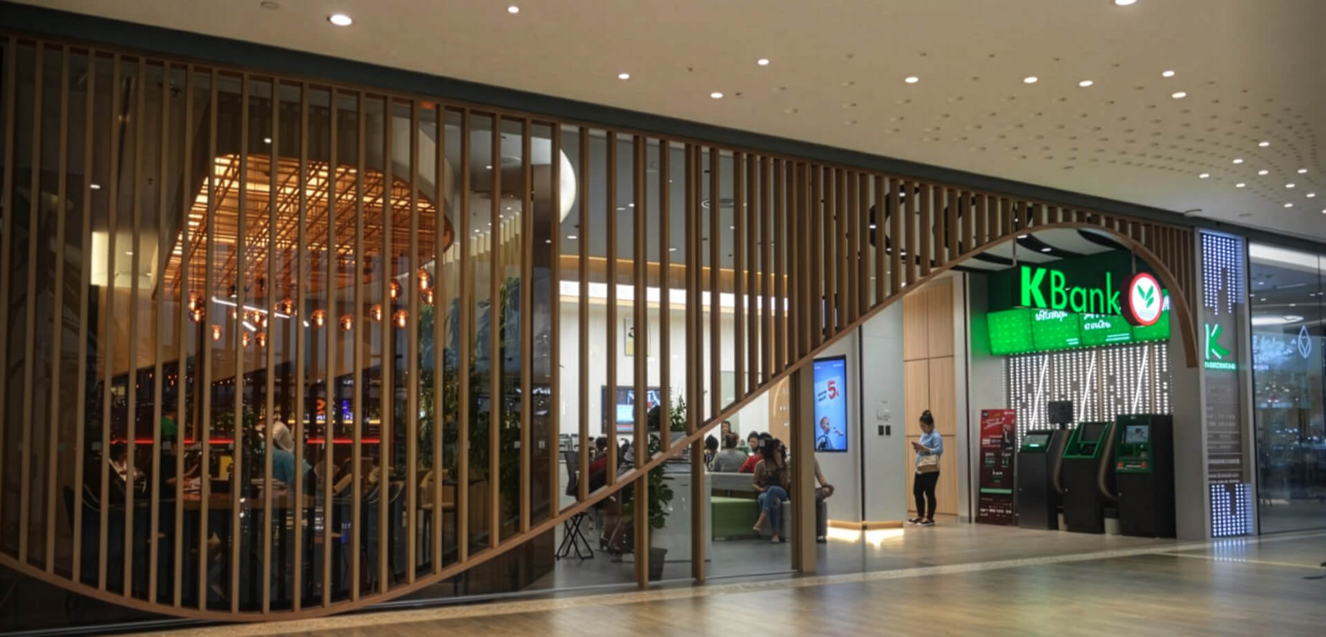 Kasikornbank: The bright green automated teller machines (ATMs) and signage on the right are for KBank.