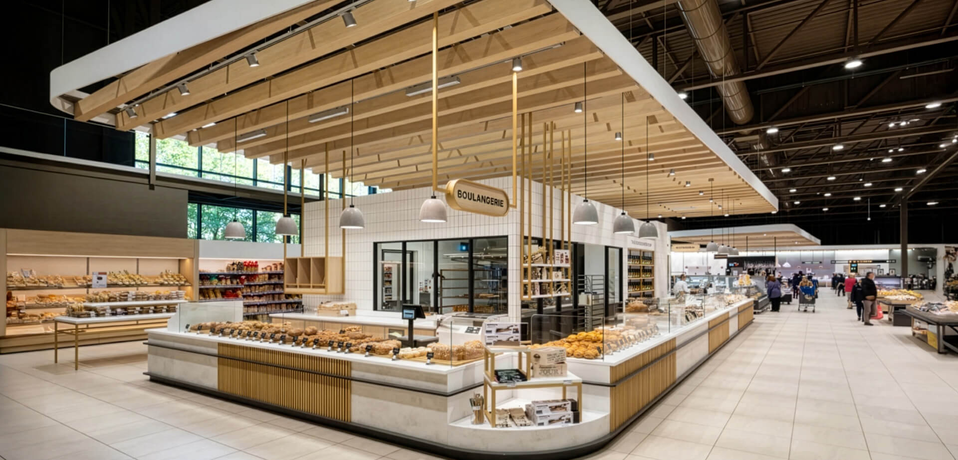 This image shows the modern bakery ("Boulangerie") section inside the E.Leclerc hypermarket in La Roche-sur-Yon, France.