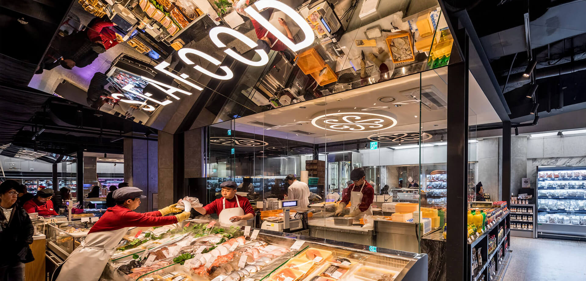 This image features the meat and deli department inside the premium SSG Food Market in Seoul, South Korea.