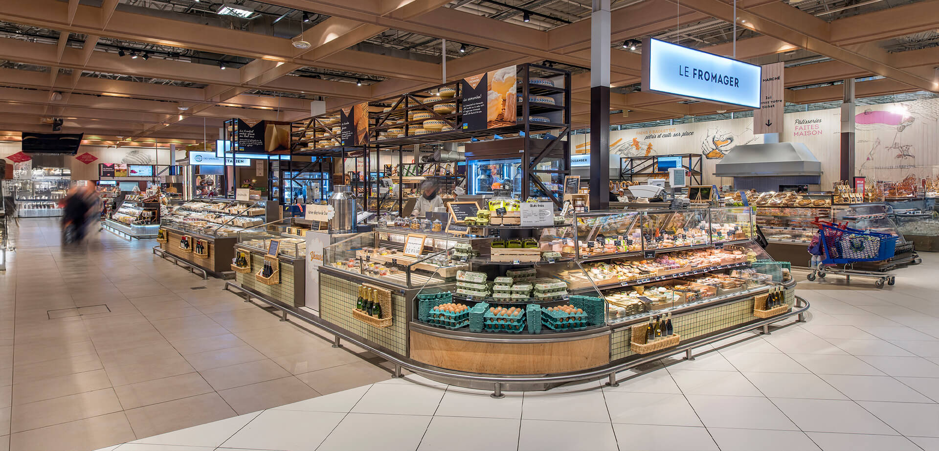 Flagship fresh food and "Le Fromager" (cheese) counter at the Carrefour hypermarket in Villiers-en-Bière, France. This redesigned "temple of fresh food".
