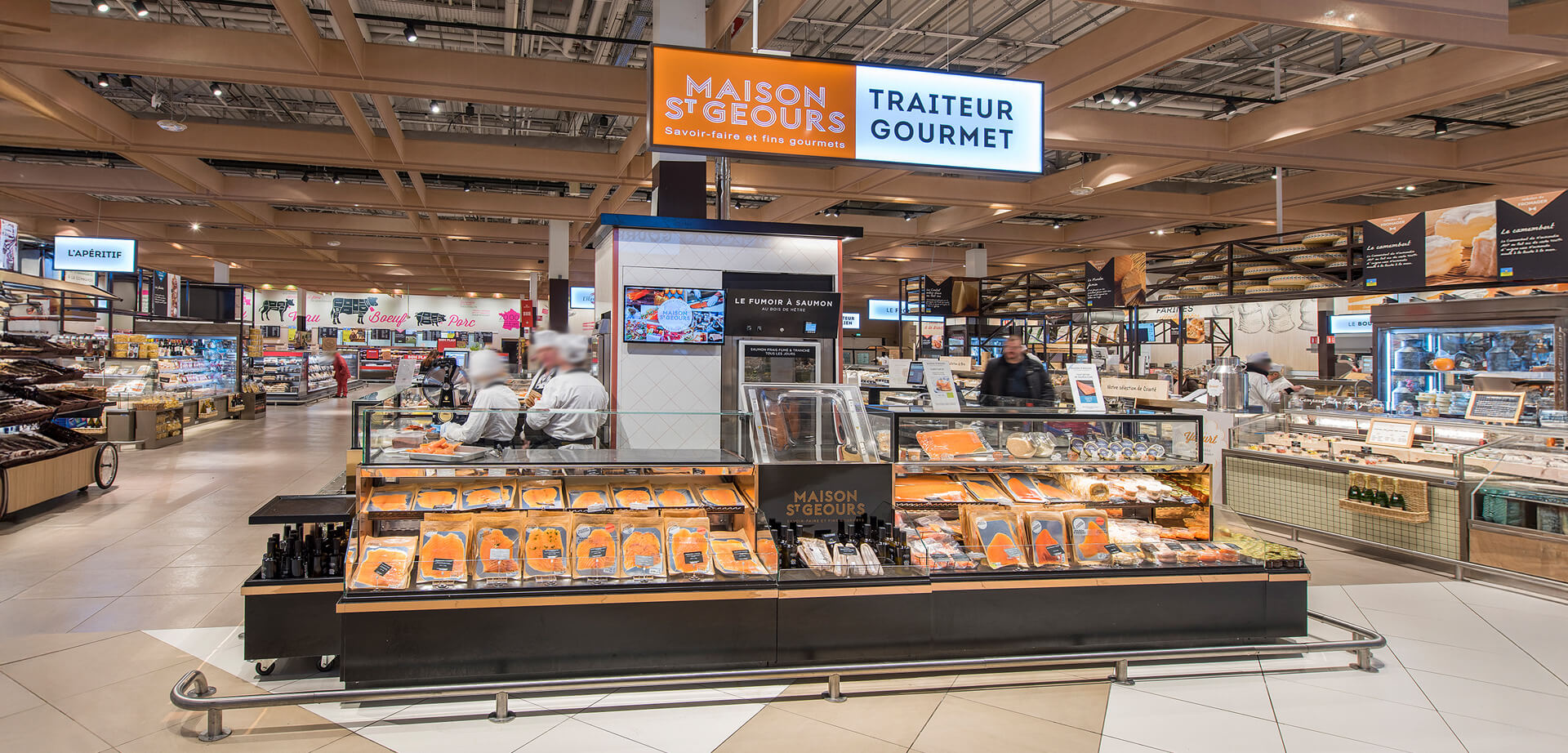 Maison St Geours Traiteur Gourmet fresh food counter and deli located inside the Carrefour hypermarket in Villiers-en-Bière, France.