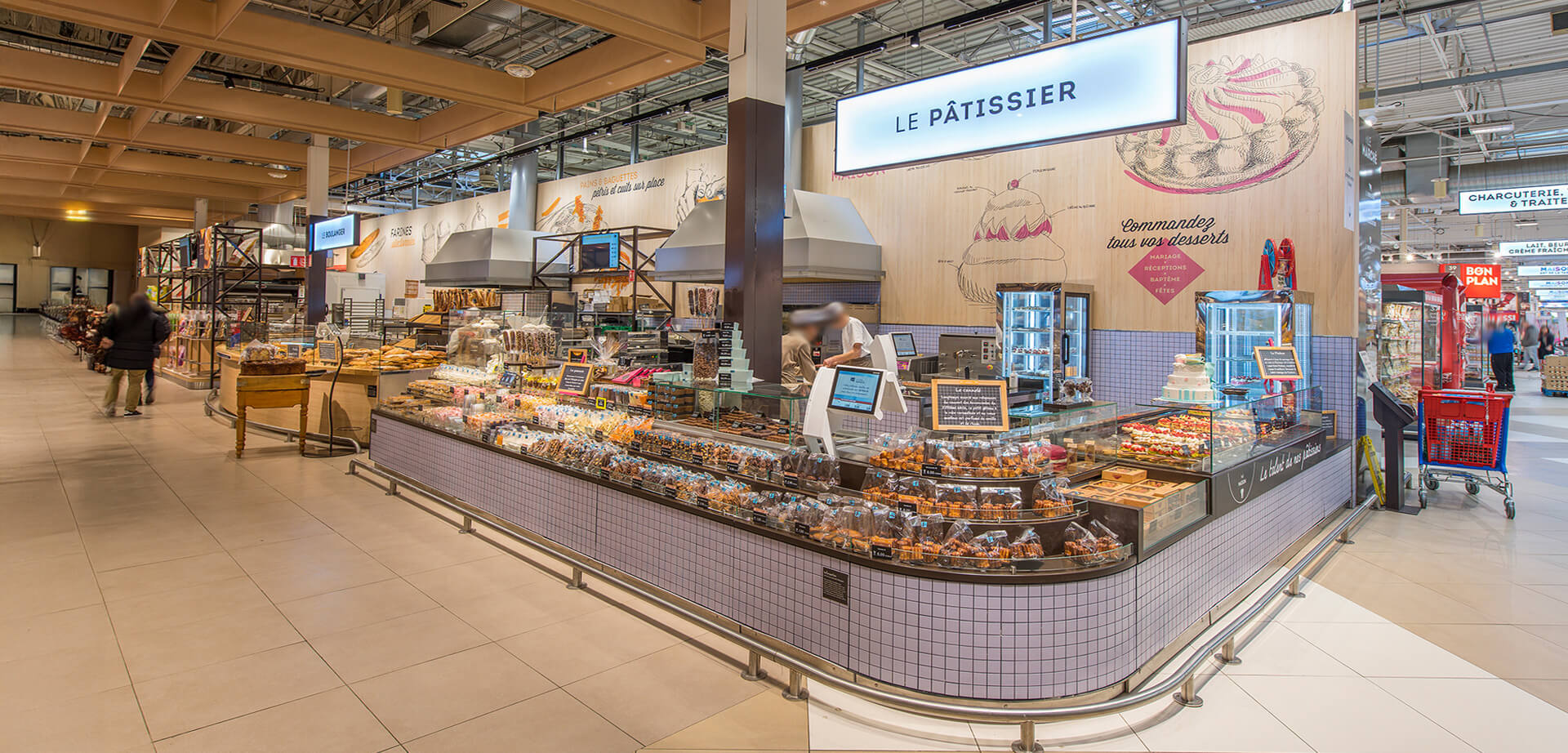 The image shows the pâtisserie (pastry and bakery) section inside the Carrefour hypermarket in Villiers-en-Bière, France.