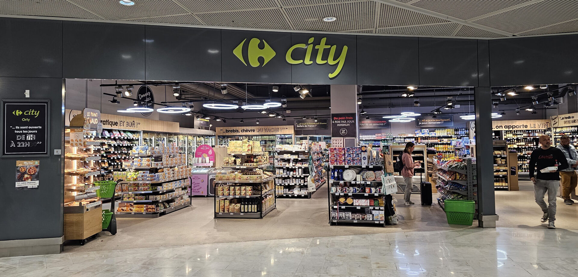 Carrefour City convenience store located in the public area of Paris Orly Airport.