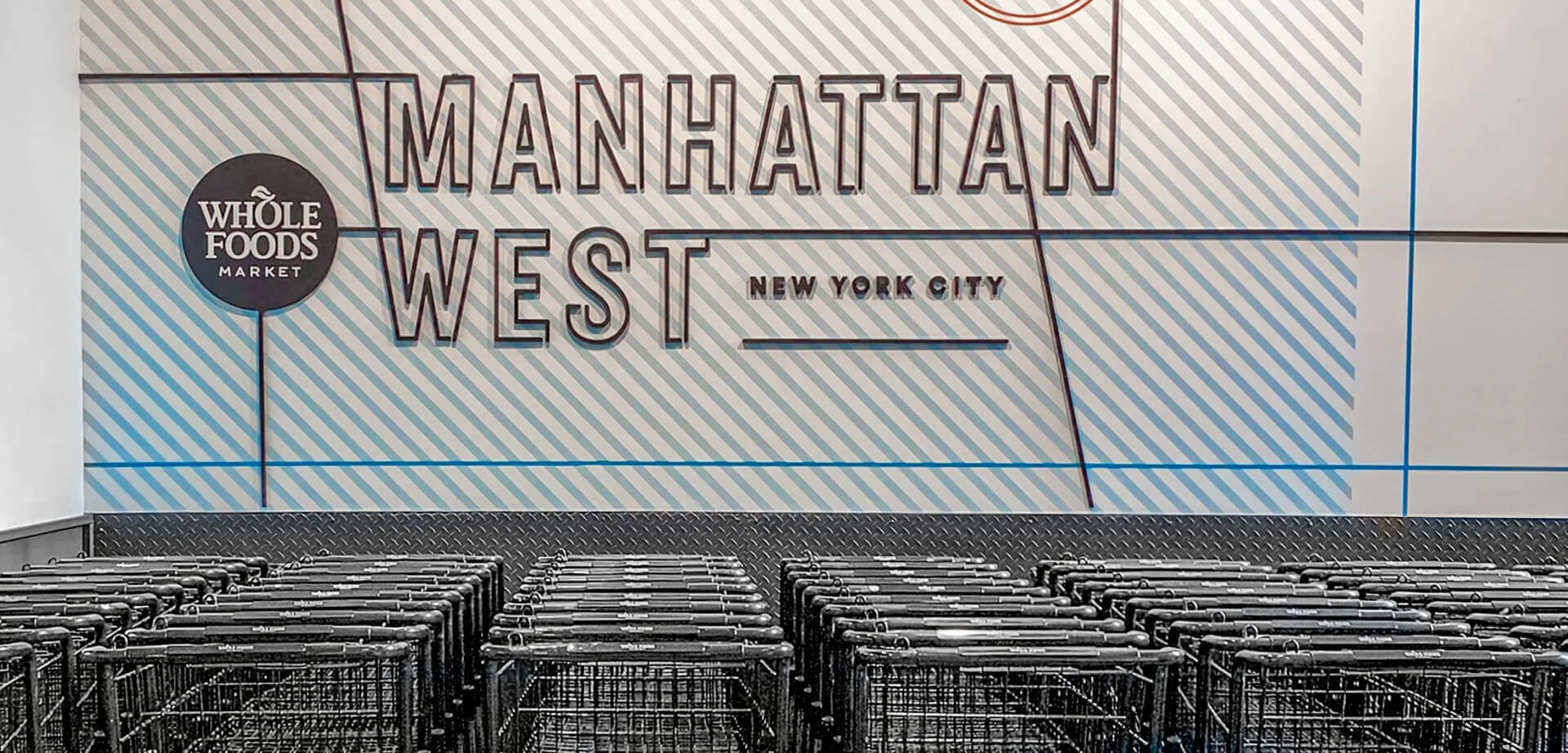 Whole Foods Market located in Manhattan West, New York City. Environmental graphics by Thread Collaborative reflecting the industrial history and energy of the West Side yard