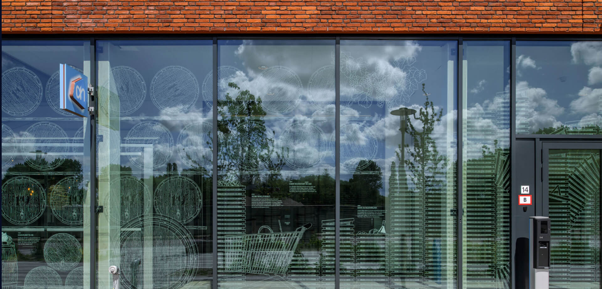 Albert Heijn flagship supermarket in Zaandam showing graphic design applied to glazing.