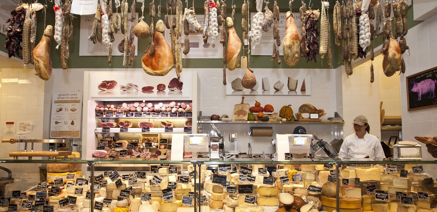 Eataly for blazing the trail for the food hall trends in cheese and delicatessan counter presentation