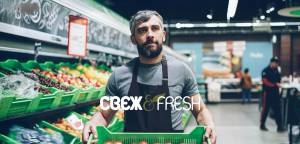CBEX & FRESH (Svezh & Fresh) Supermarket, staff member in the fresh vegetables department - emphasiz