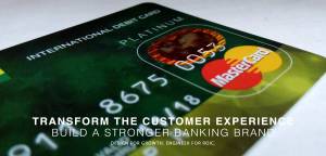 The image shows an International Platinum Debit Card on the Mastercard network, a payments technology used in over 210 countries. 