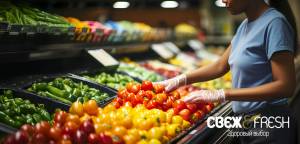 CBEX & FRESH (Svezh & Fresh) Supermarket, staff member in the fresh vegetable department.