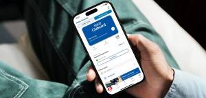 Tesco Clubcard app interface on a smartphone. The app allows users to manage their loyalty points, a