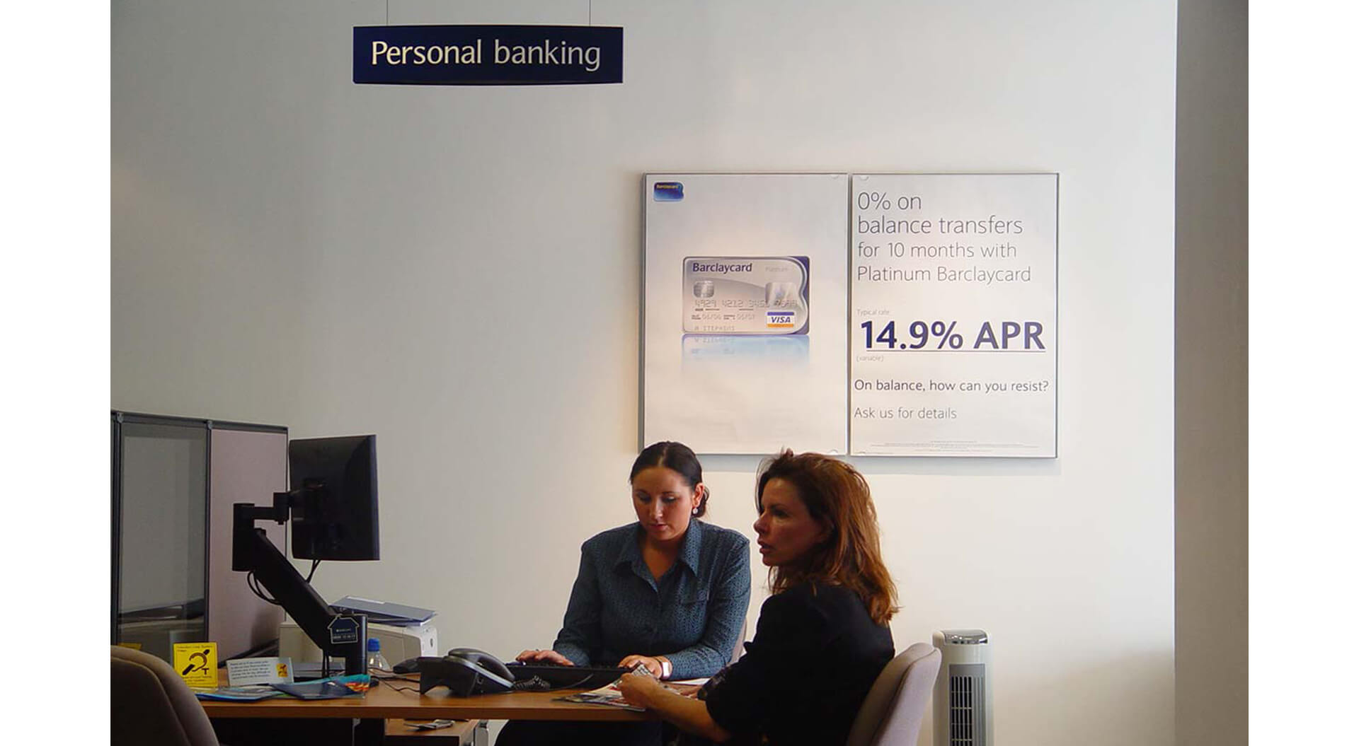 Personal banking desk at Barclays Bank branch interior design