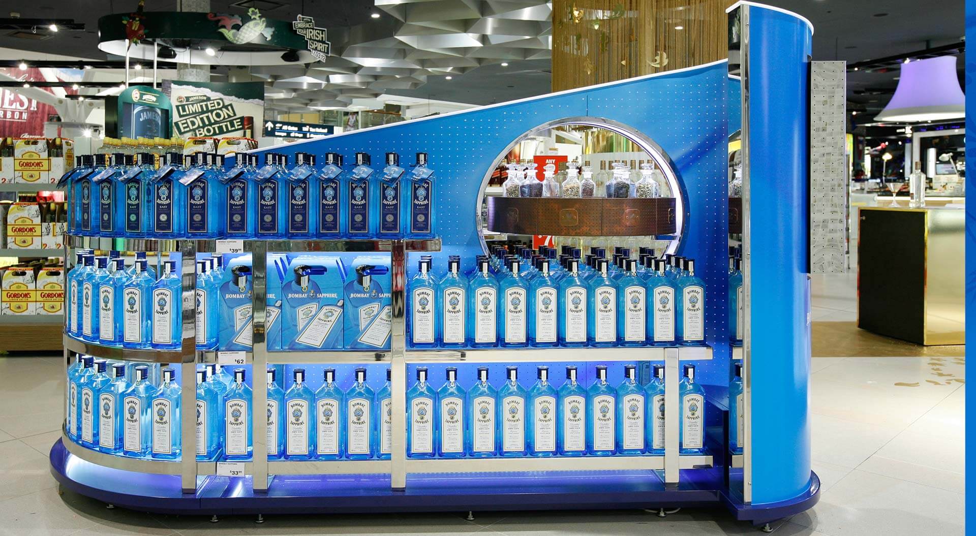 Bacardi Bombay Sapphire spirits industry promotion merchandising systems design at Sydney airport for duty free travel retail