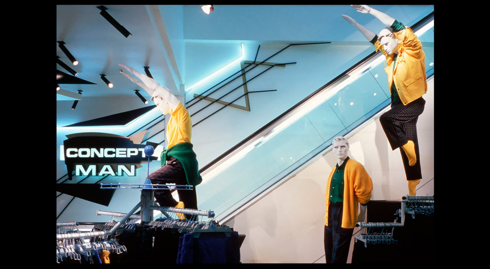 Concept Man brand interior store design internal brand signage for shop escalators