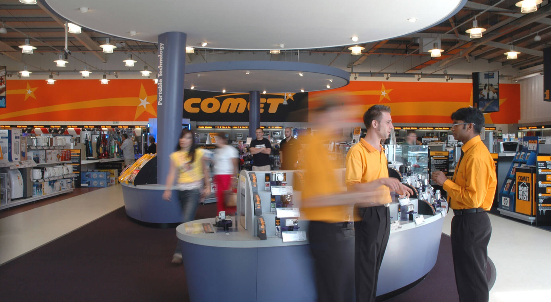 Comet electronic and technology reatil store design merchandising systems
