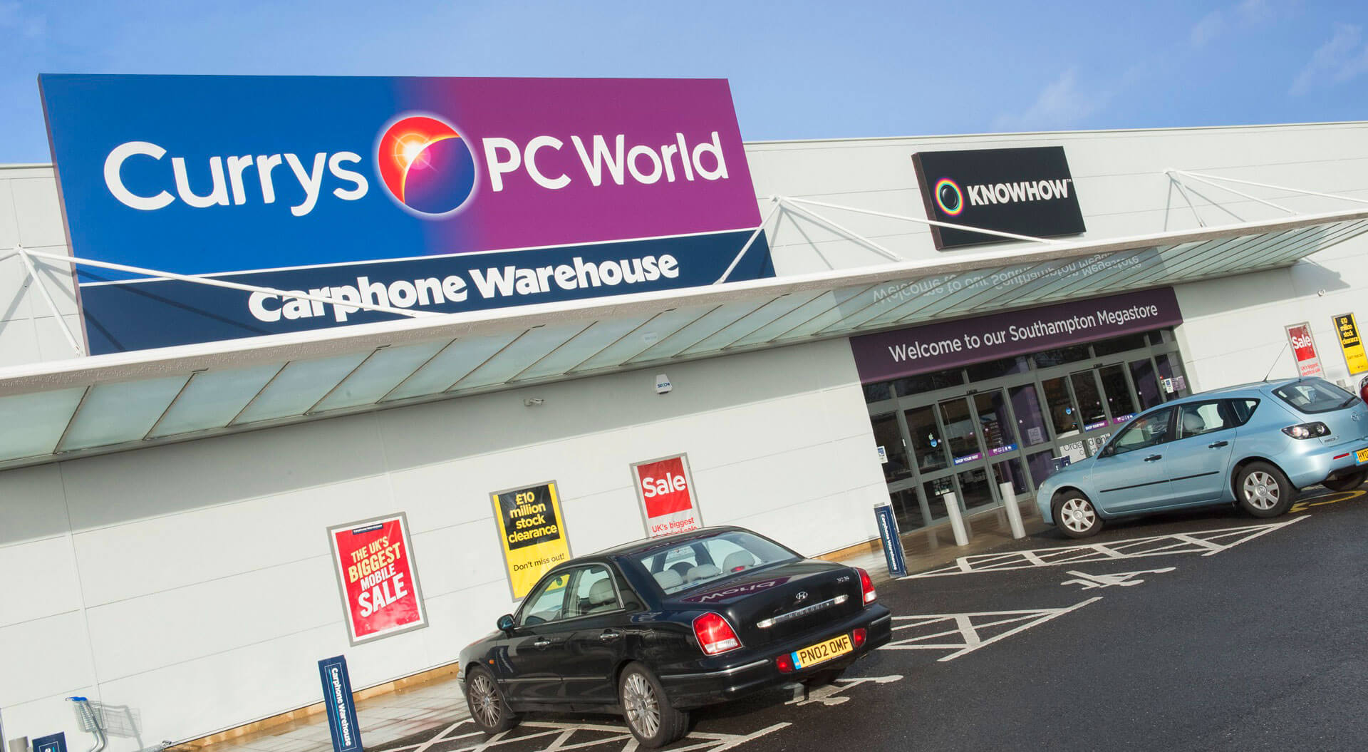 Currys PC World electronics technology retail branding applied to store exteriors