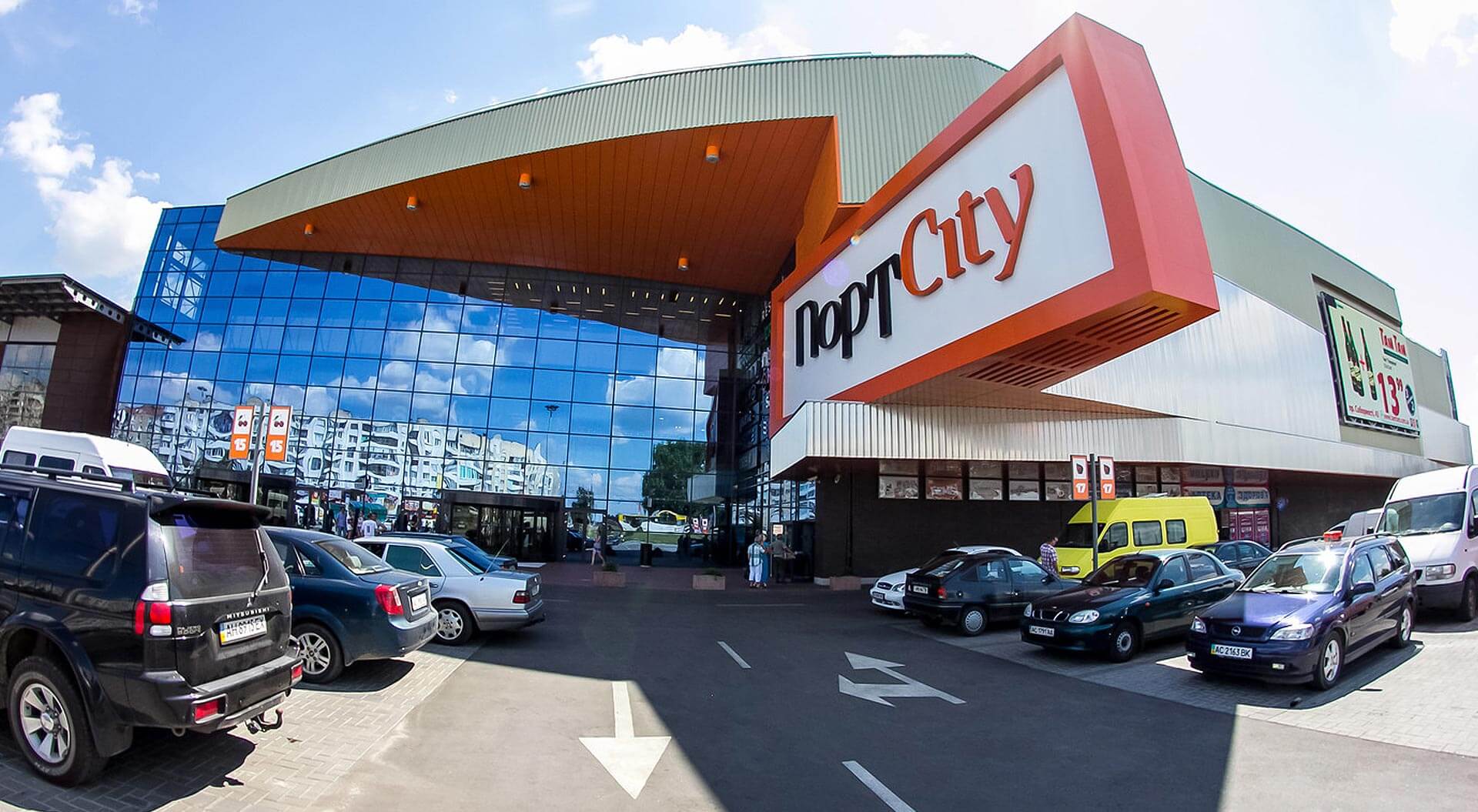 Port City shopping mall brand identity entrance signage Lutsk, Ukraine