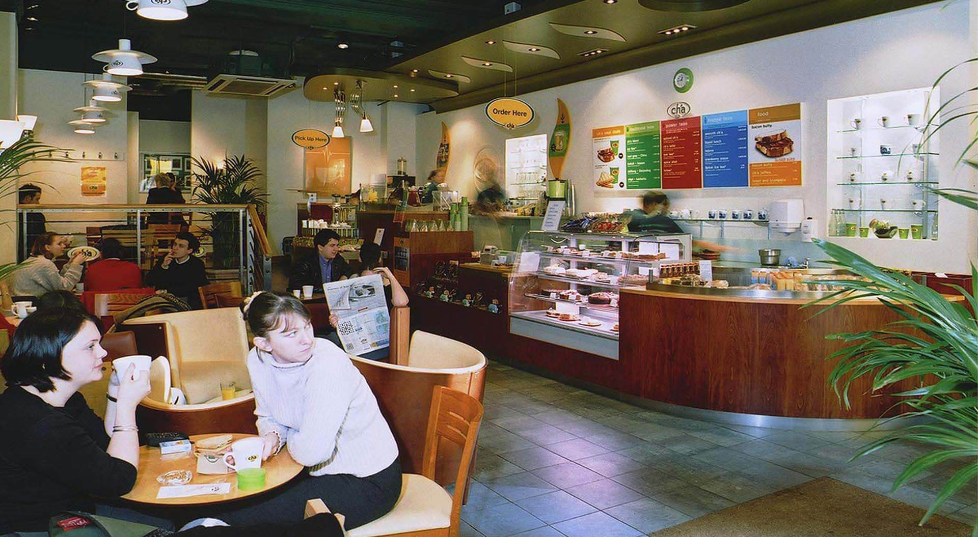 Cha Teahouse café  seating area and serve over counter interior design and branding