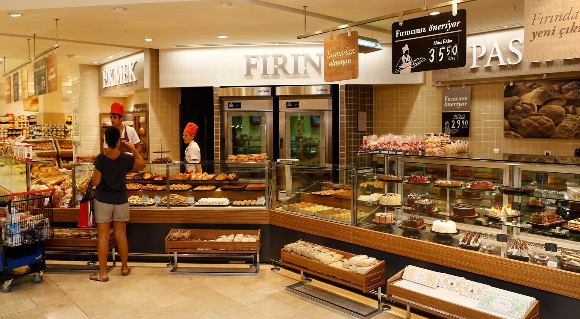Migros Turkey supermarket bakery merchandising store design and internal brand communications