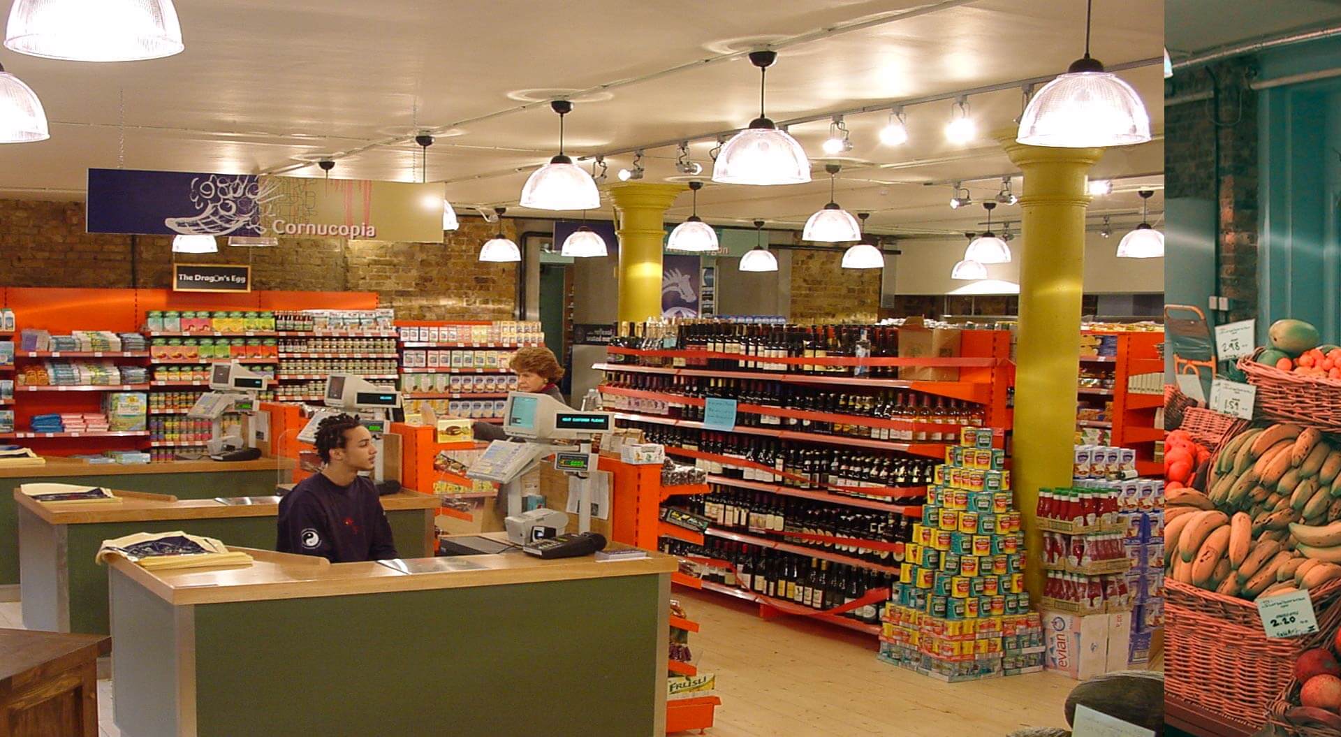 Sundace Organic supermarket interior design with checkout and branding